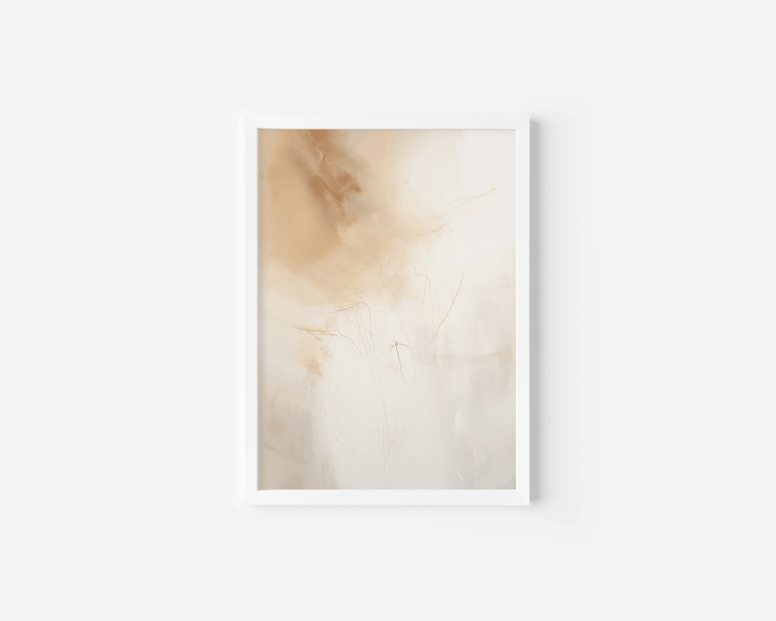 Close-up of a beige, gold, cream and white marble effect abstract canvas wall art print with a white frame on a white wall