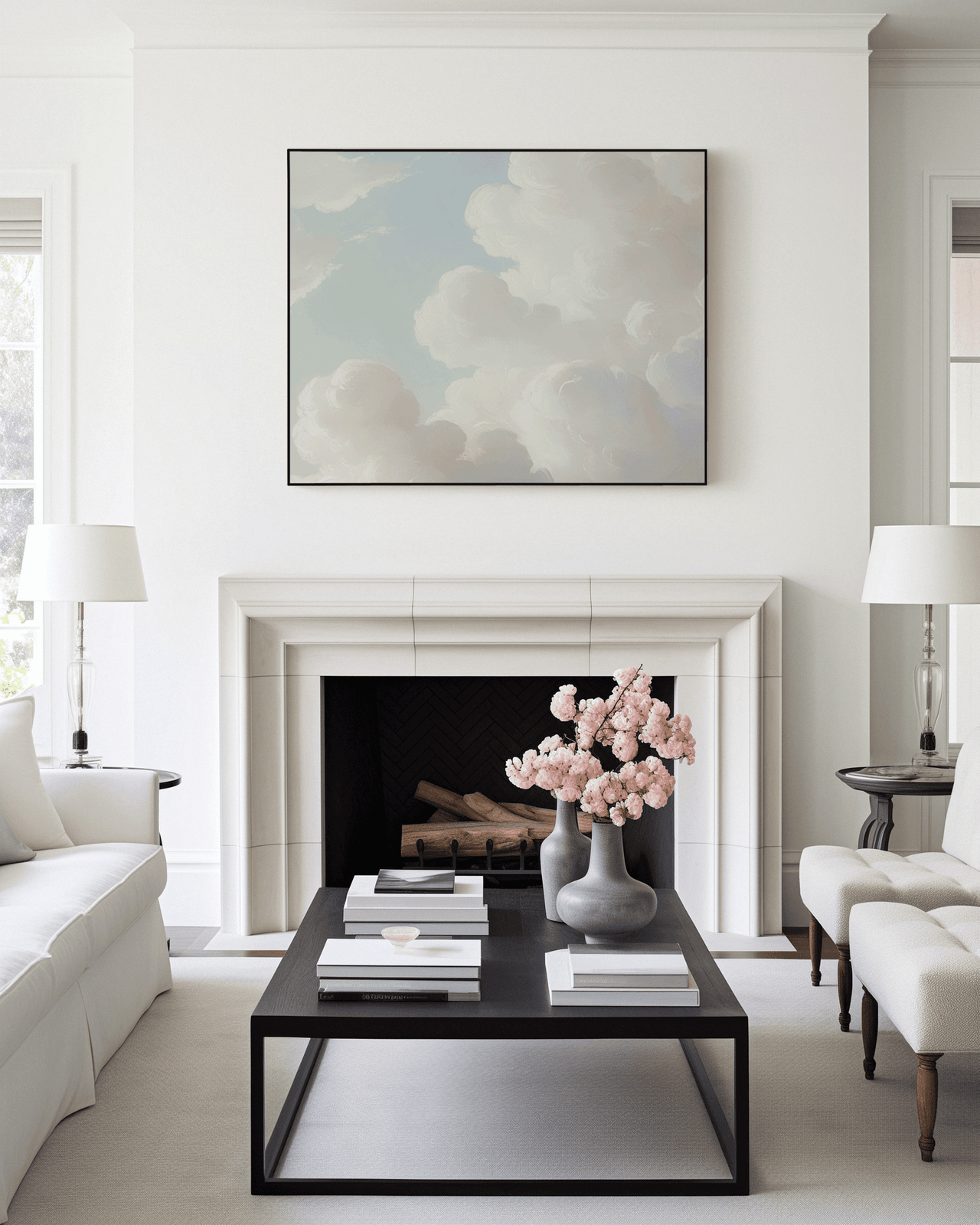 Large vintage white and blue cloud canvas wall art with a black frame above fireplace in neutral modern living room
