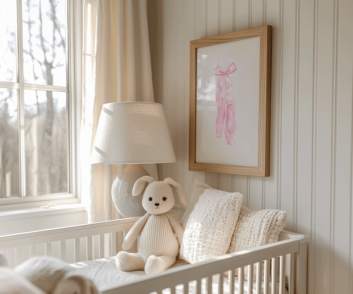Coquette ballet slipper framed wall art print hung in nursery above crib