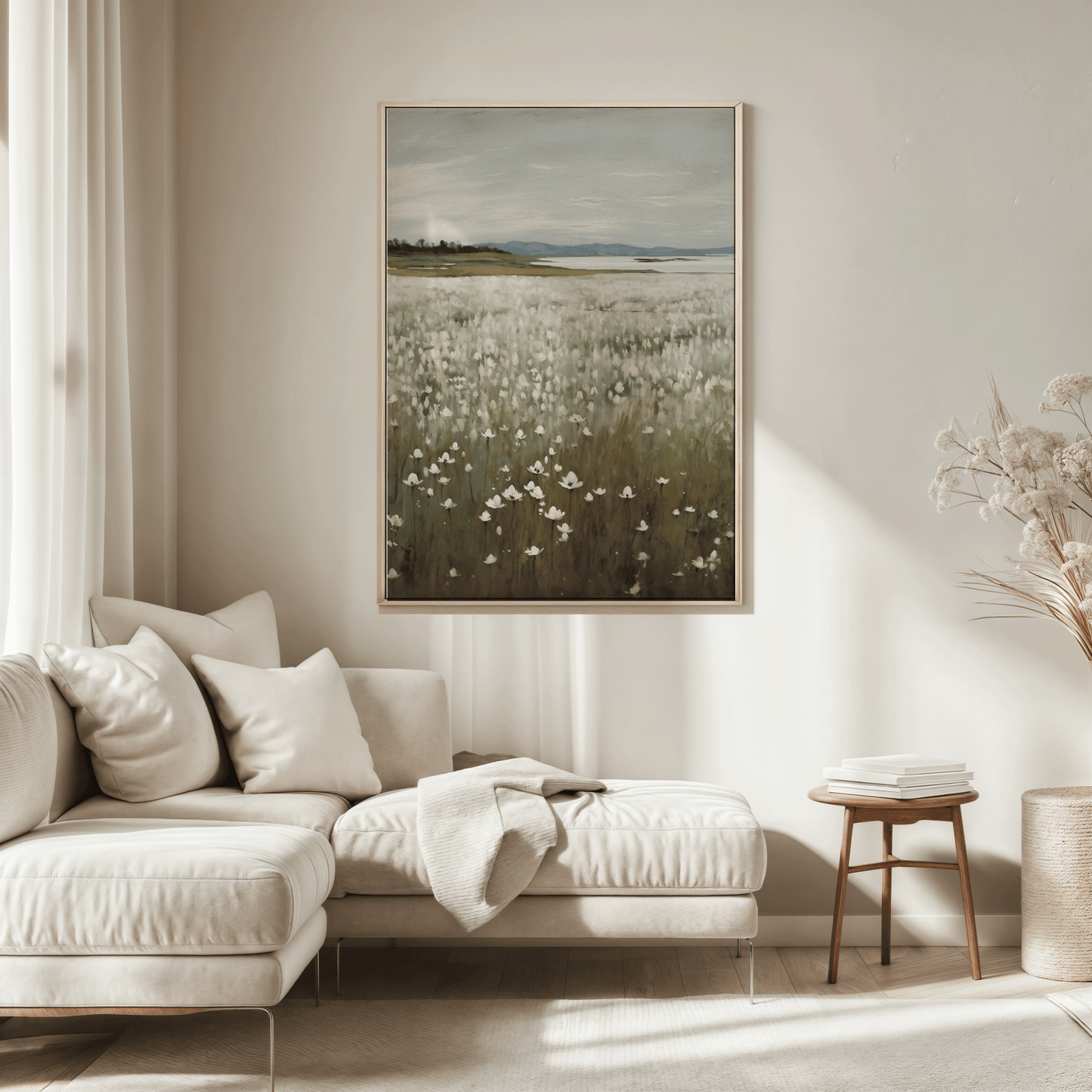 Oversized wildflower landscape canvas with soft muted colors styled in a neutral living room, creating a rustic cottagecore aesthetic perfect for nature-inspired home décor.