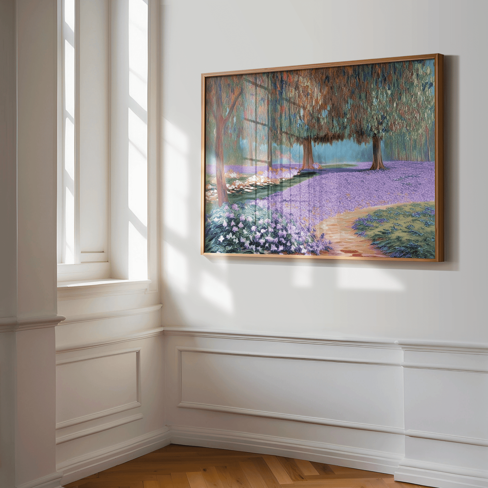 Countryside lavender field artwork canvas print with trees and flower-lined path in warm evening light, and a light wood frame on a white wall in a hallway with natural sunlight.