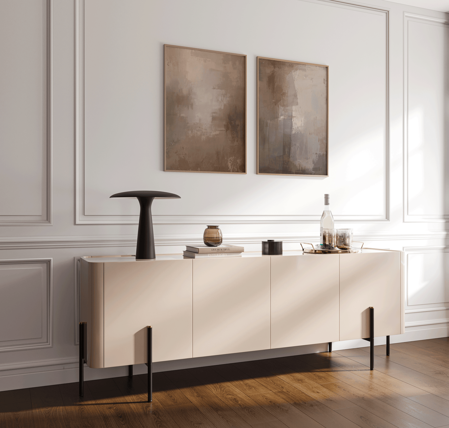 pair of warm earthy beige and brown abstract wall art prints displayed above a modern entryway console, embodying minimal wabi-sabi inspired style