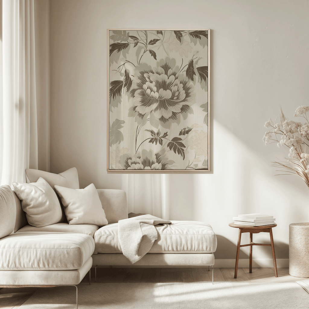 Botanical floral wall art with muted green and creamy beige tones displayed above beige sectional sofa in cozy modern living room