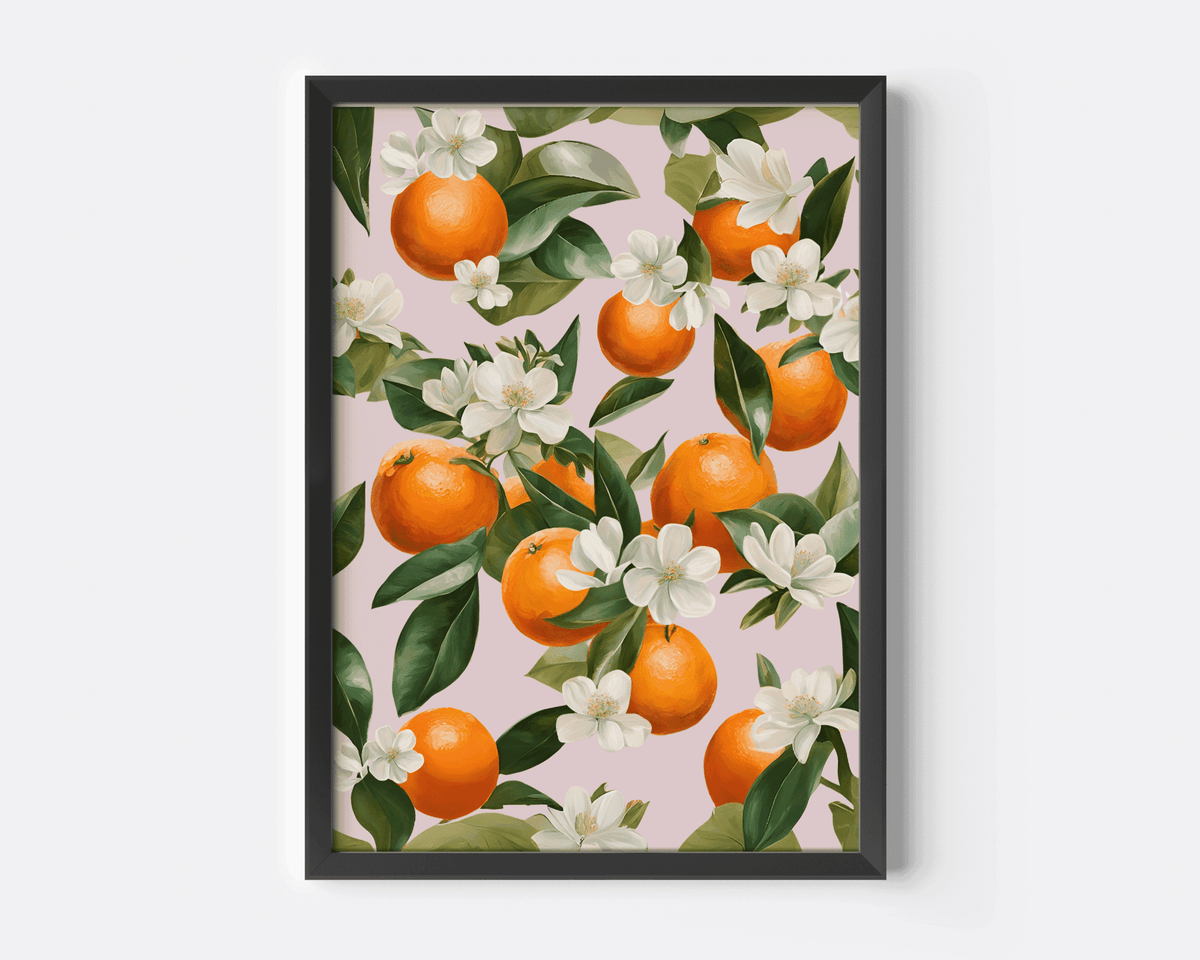 Black-framed citrus wall art featuring oranges, green leaves, and white blossoms on a blush pink background — modern botanical print for kitchen or dining wall décor