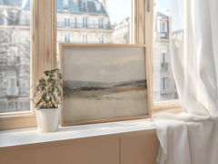 Framed Abstract Landscape Art Print in Neutral Beige and Blue Styled on Bright Window Ledge