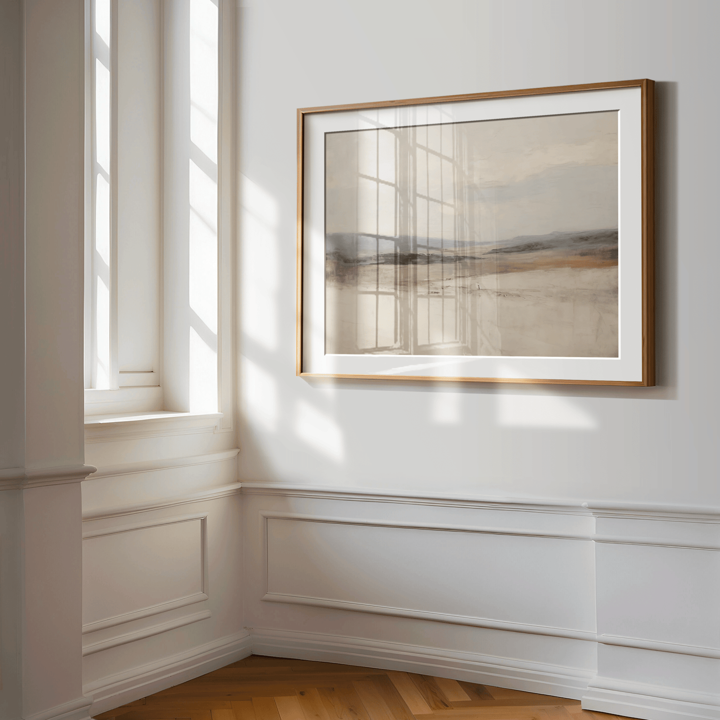 Framed Abstract Landscape Wall Art in Neutral muted Tones Displayed on White Wall in a hallway with wainscotting