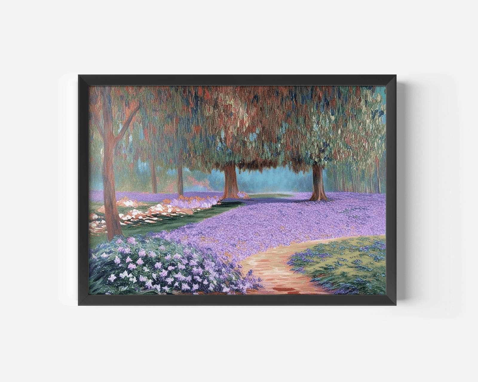 Purple lavender field landscape canvas wall art print with a black frame featuring a peaceful countryside scene with trees and blooming purple flowers against a white wall.