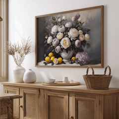 Vintage peony floral still life wall art with brown wooden frame and lemons styled above a side console table in a dining room 
