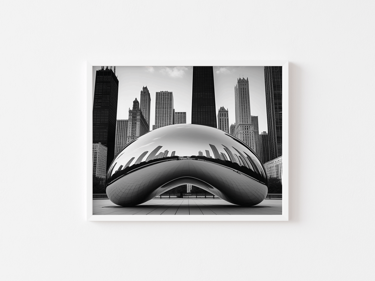 Black and white photo of a modern architectural structure with city skyline in the background with a white frame on a white wall background