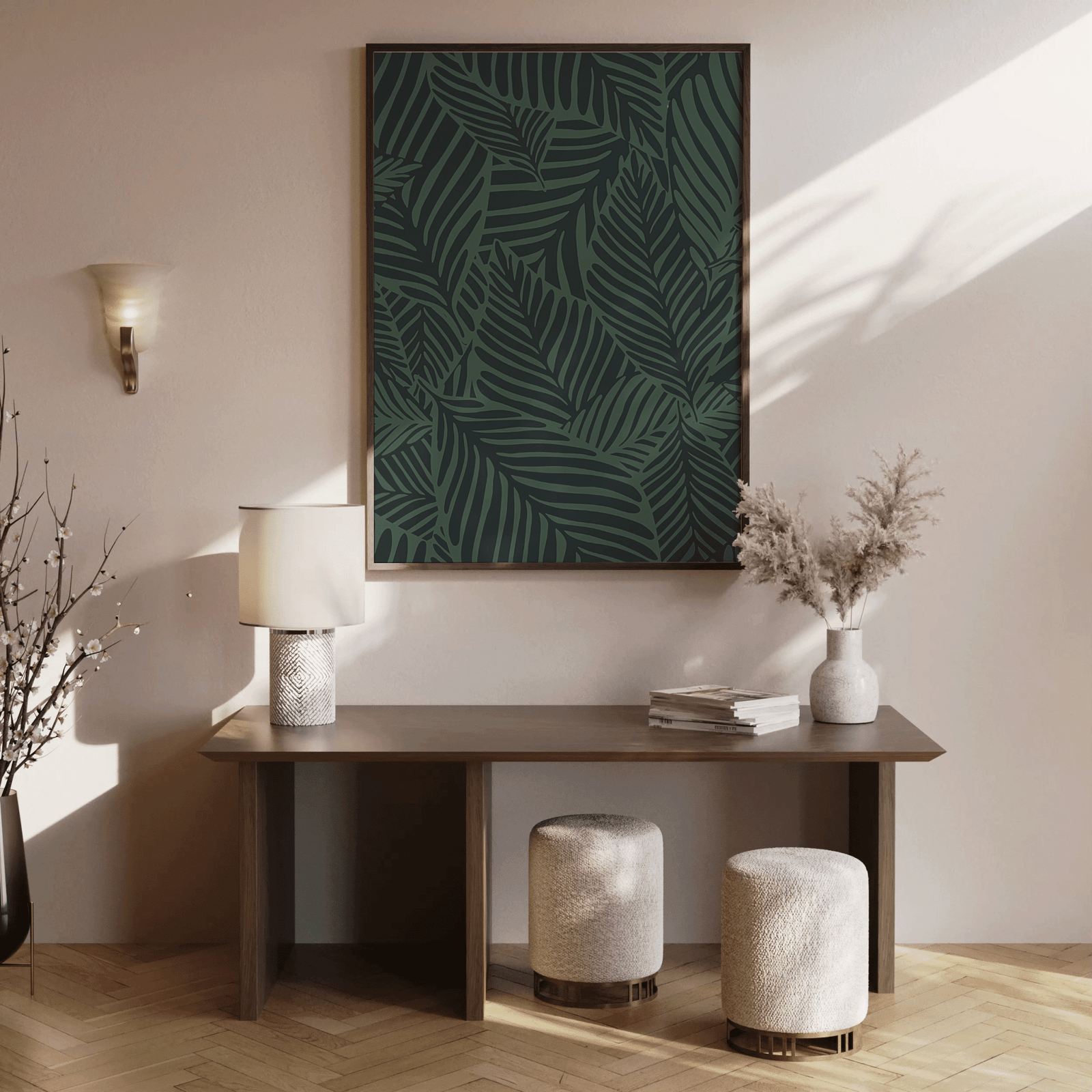 Green palm leaf botanical wall art in a wood frame above a console table in a sunlit entryway