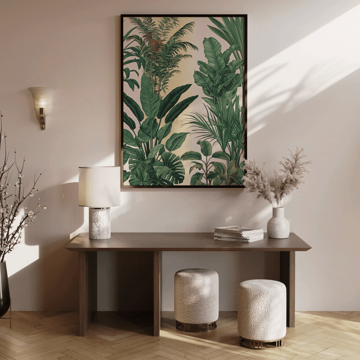 Green tropical leaf wall art in a wood frame above a console table in a sunlit entryway