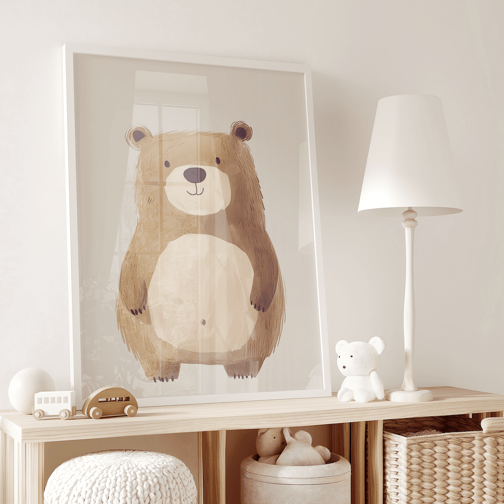 Large teddy bear wall art print with a white frame leaning on shelf in kids room with neutral decor and toys