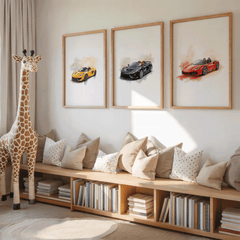 Kids reading nook with bookshelves and pillows under three framed watercolour sports car prints