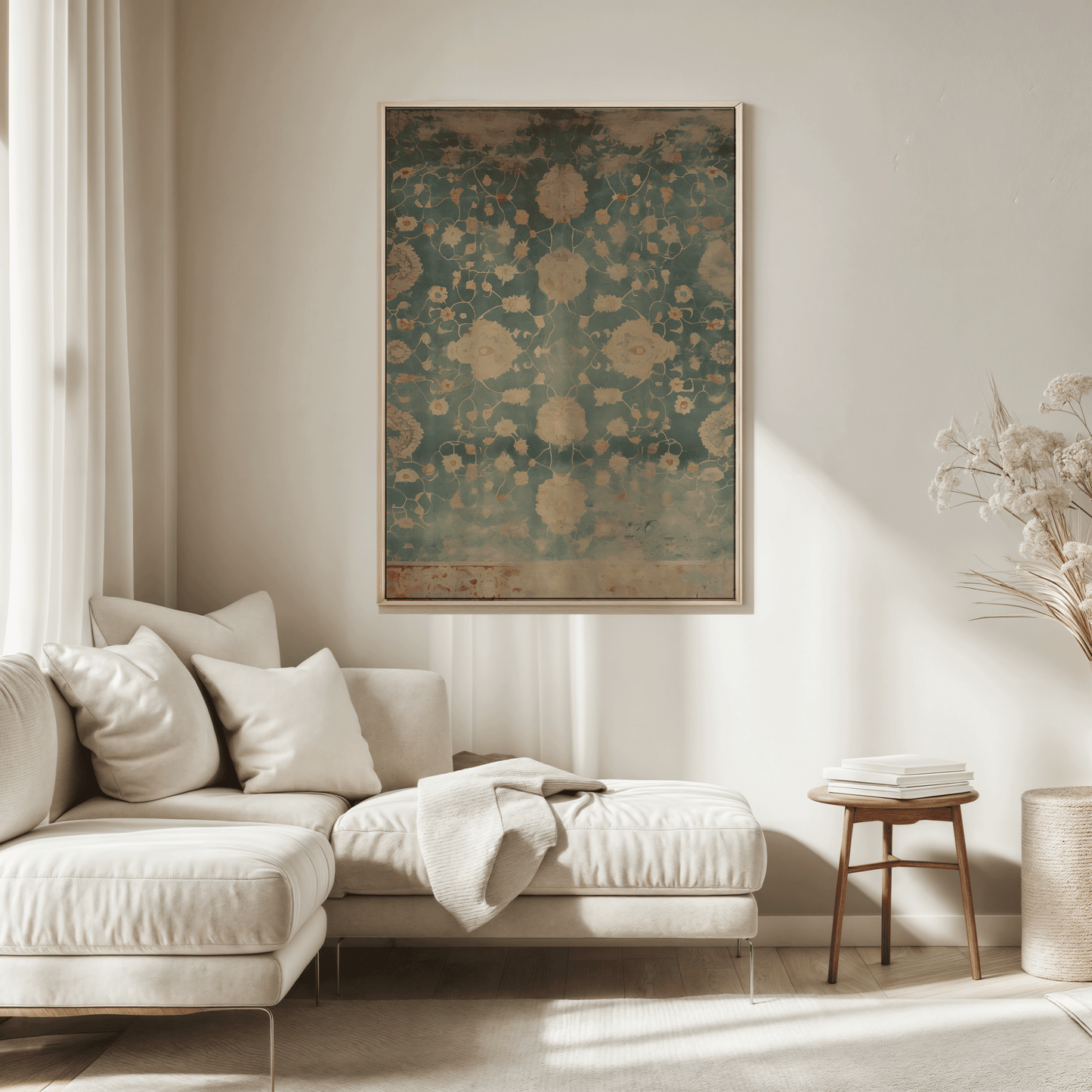 Living room with a beige sofa, decorative pillows, and a large framed blue and beige botanical wall art print