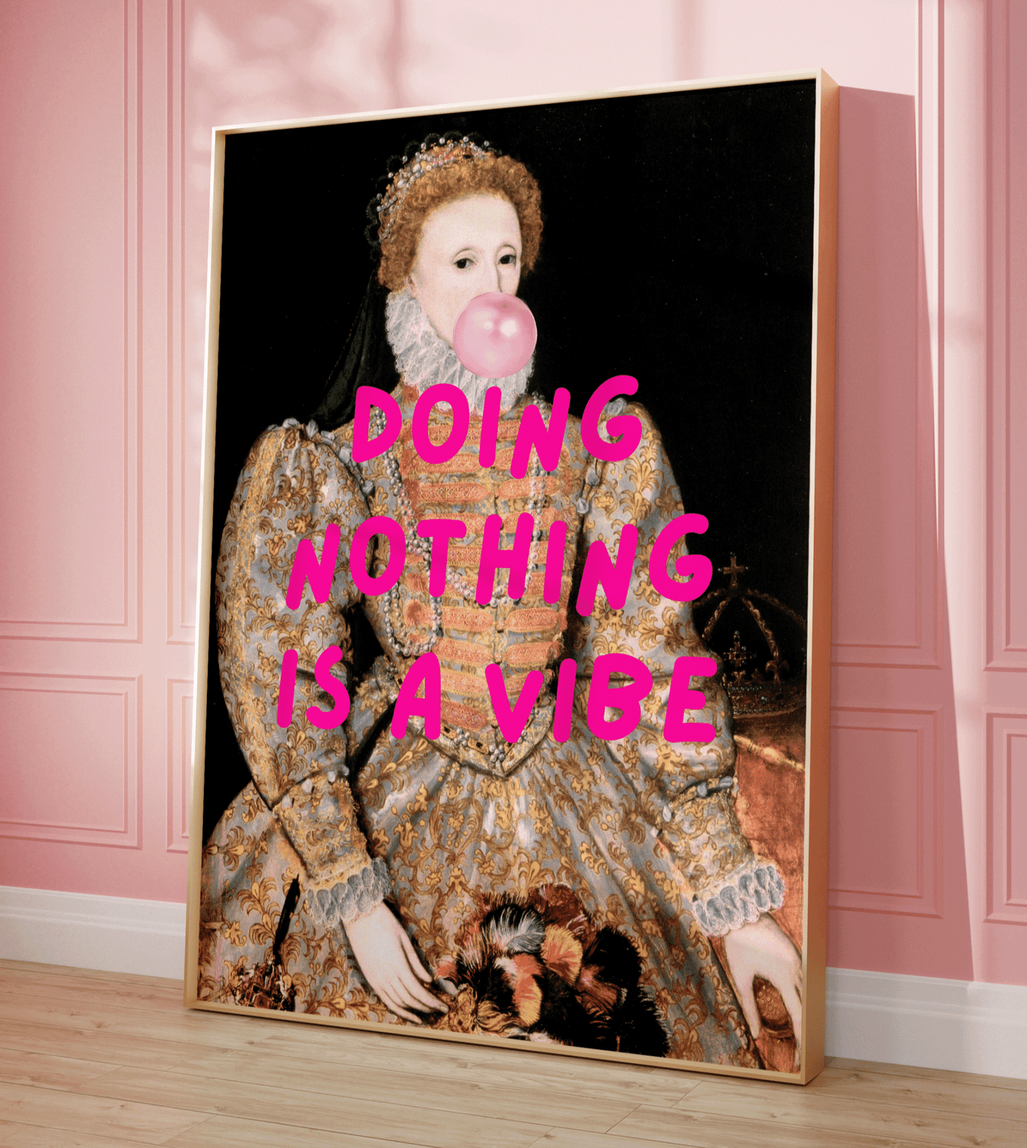 Large funny vintage canvas wall art print framed against pink wall with bold text that says, 'doing nothing is a vibe'