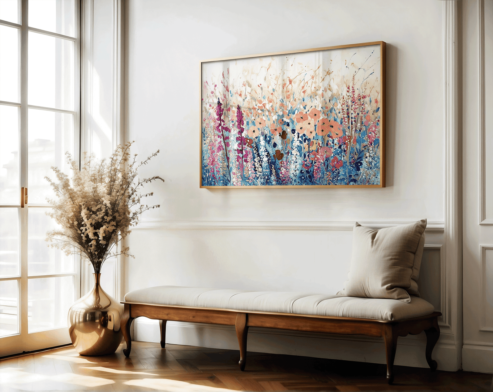 Large framed impressionist floral wall art print featuring wildflowers and soft brushstrokes displayed above a wooden bench in a hallway