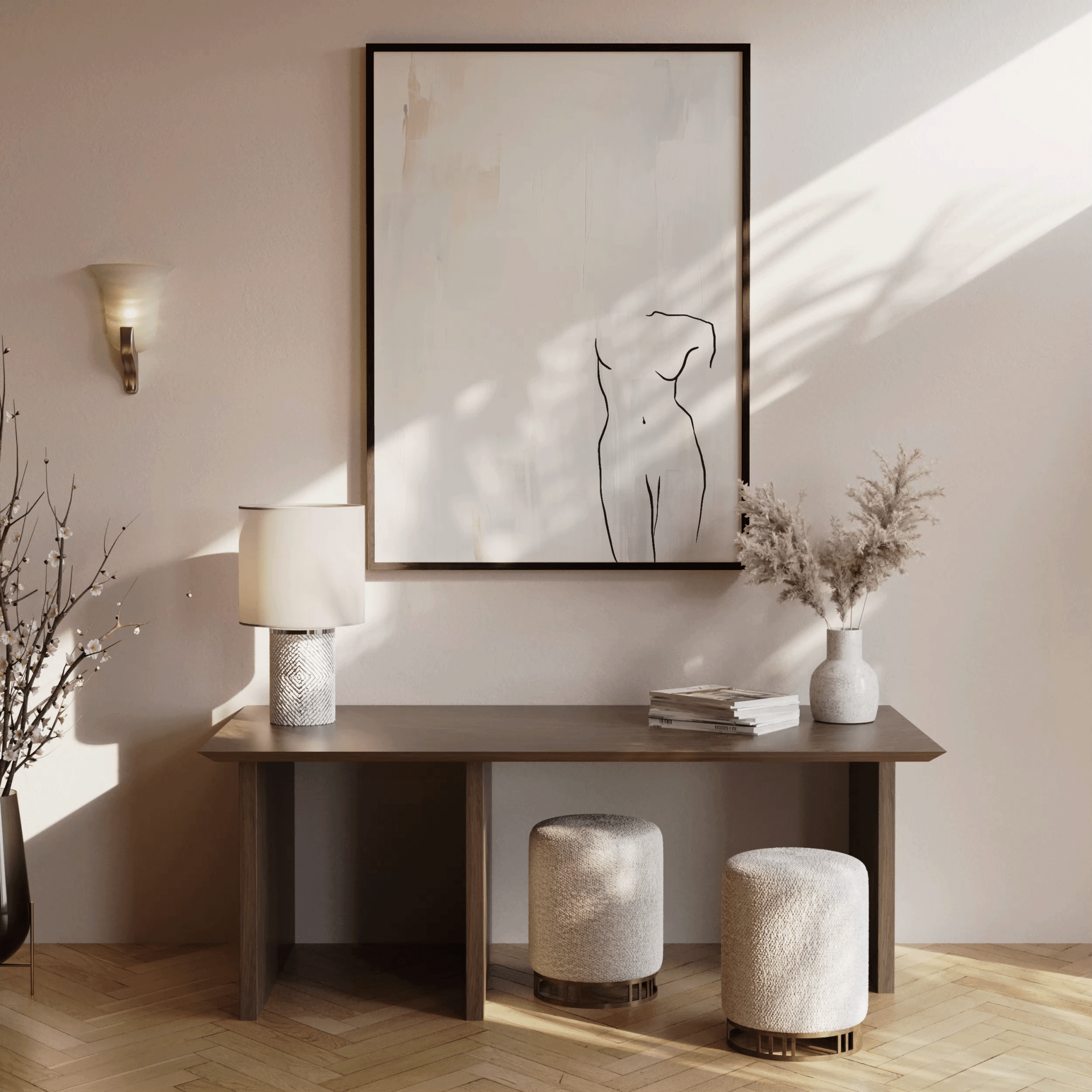 Oversized minimalist figure wall art framed in wood above a console table in an entryway or hallway with ceramic vase, dried florals, and soft morning sunlight casting shadows on neutral walls