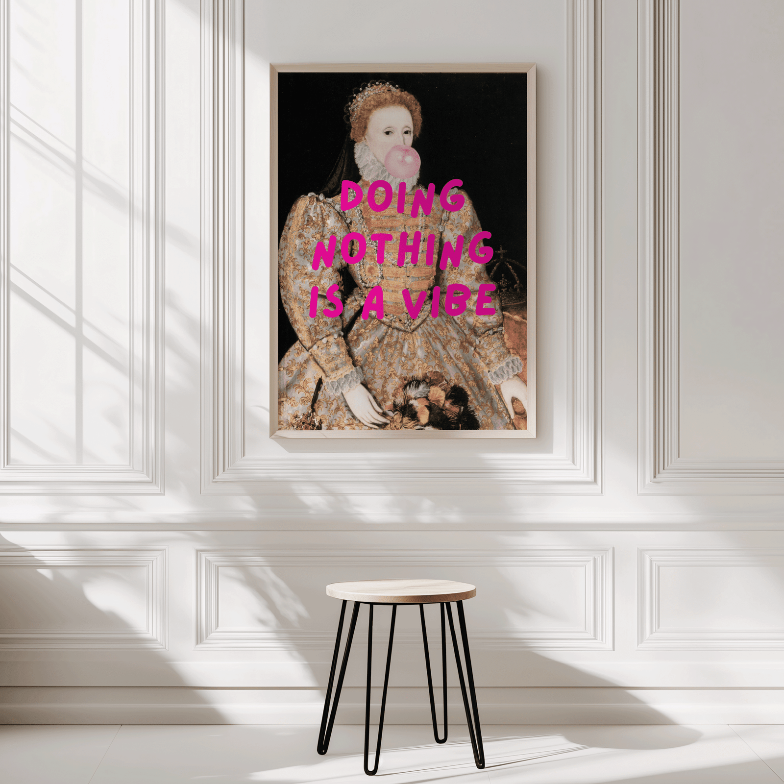 large vintage portrait funny framed wall art on paneled wall above stool of a victorian princess blowing bubble gum