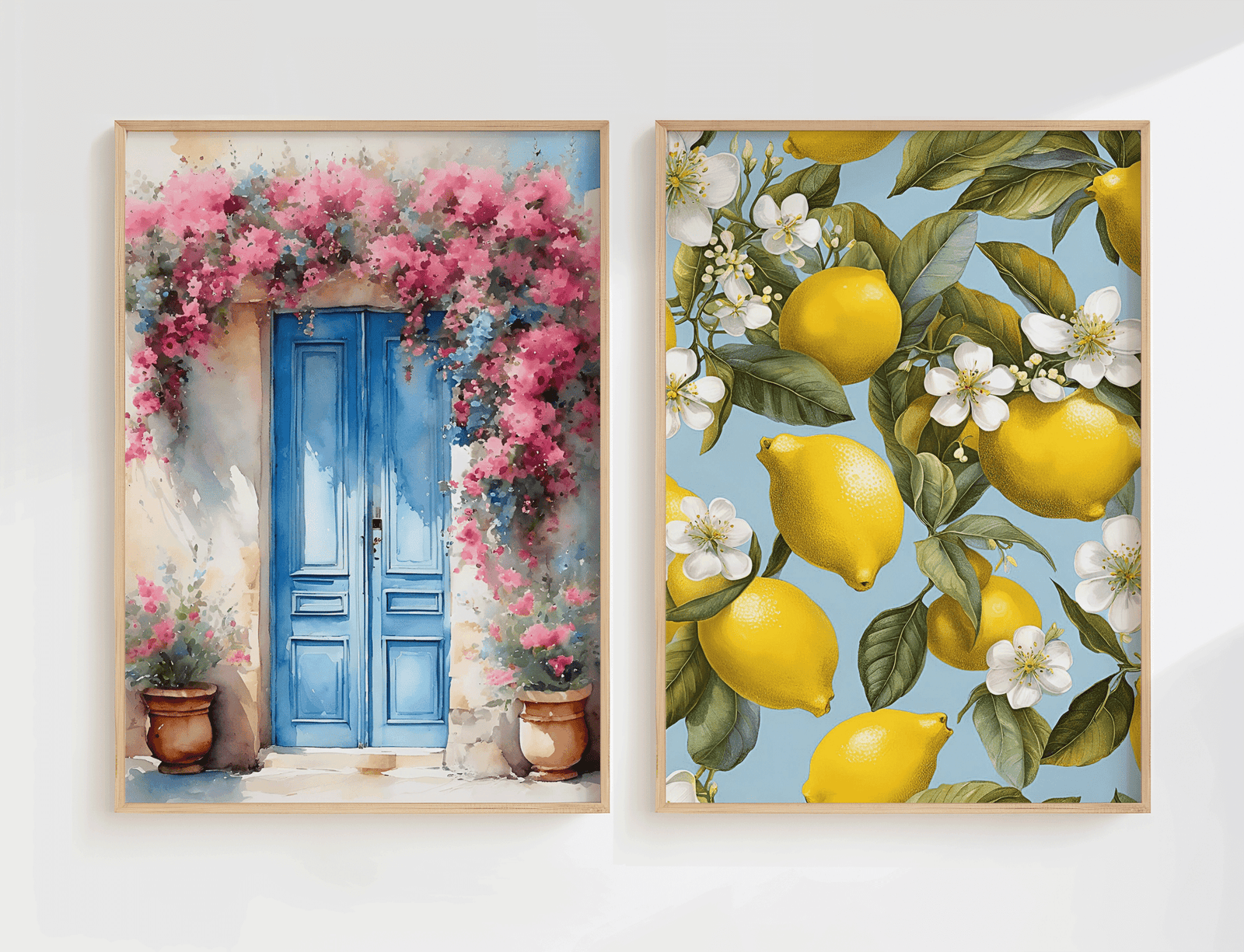 Mediterranean wall art set of 2 featuring a blue door floral print and lemon botanical artwork with white blossoms on a soft blue background
