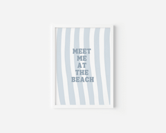 White framed meet me at the beach wall art on a plain white background