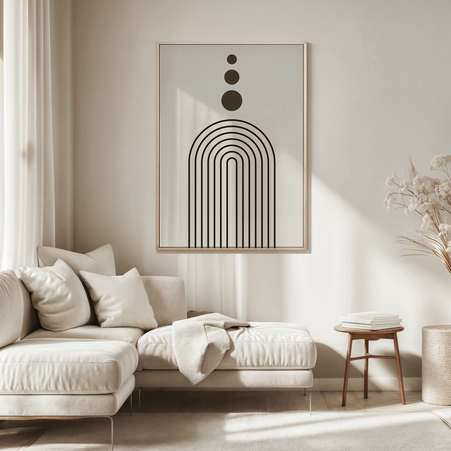 Minimalist arch wall art above a beige sofa in a bright, sunlit living room