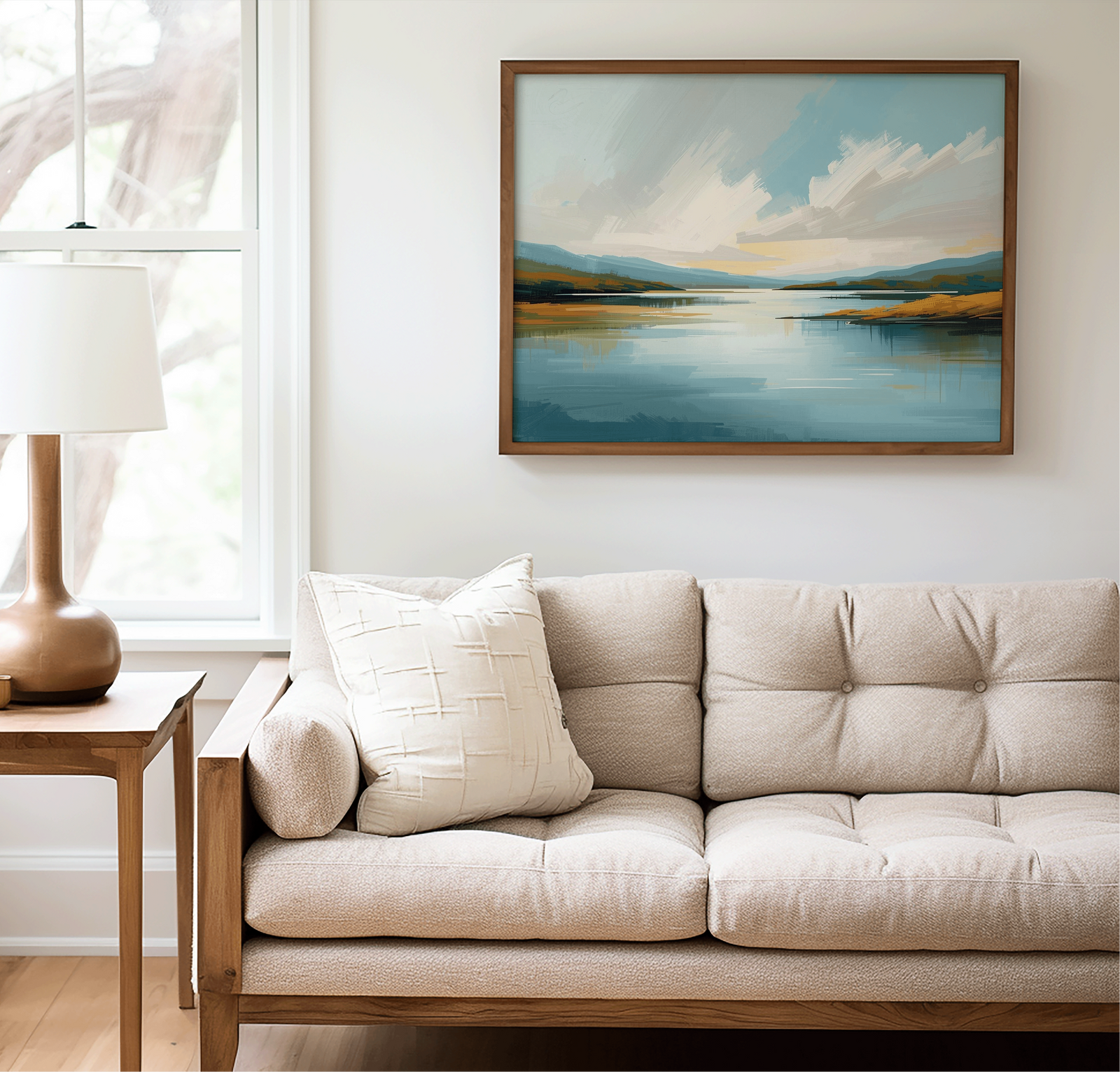 Minimalist blue nature landscape wall art above beige sofa in neutral living room