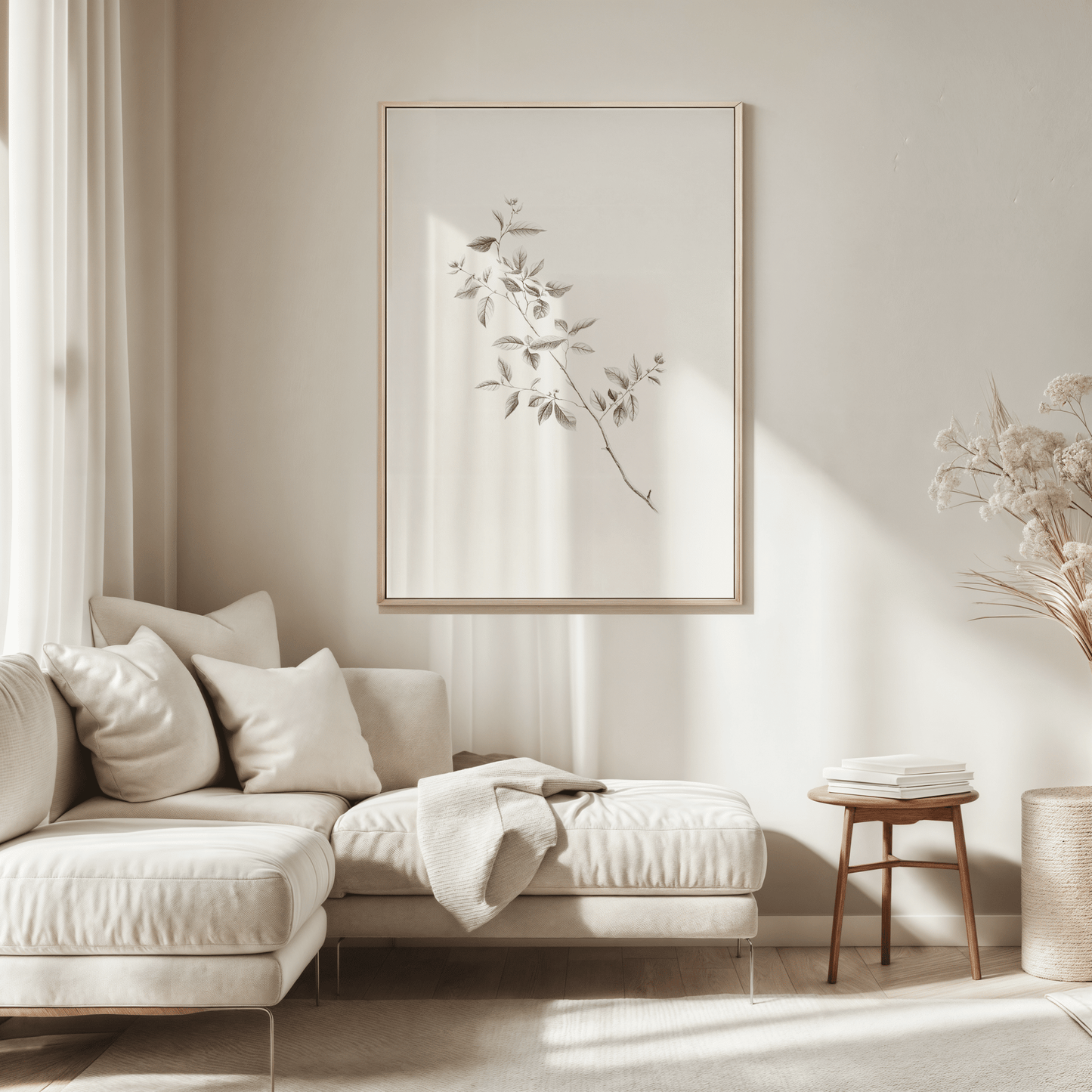 Neutral botanical line drawing wall art styled above beige modern sofa in modern living room