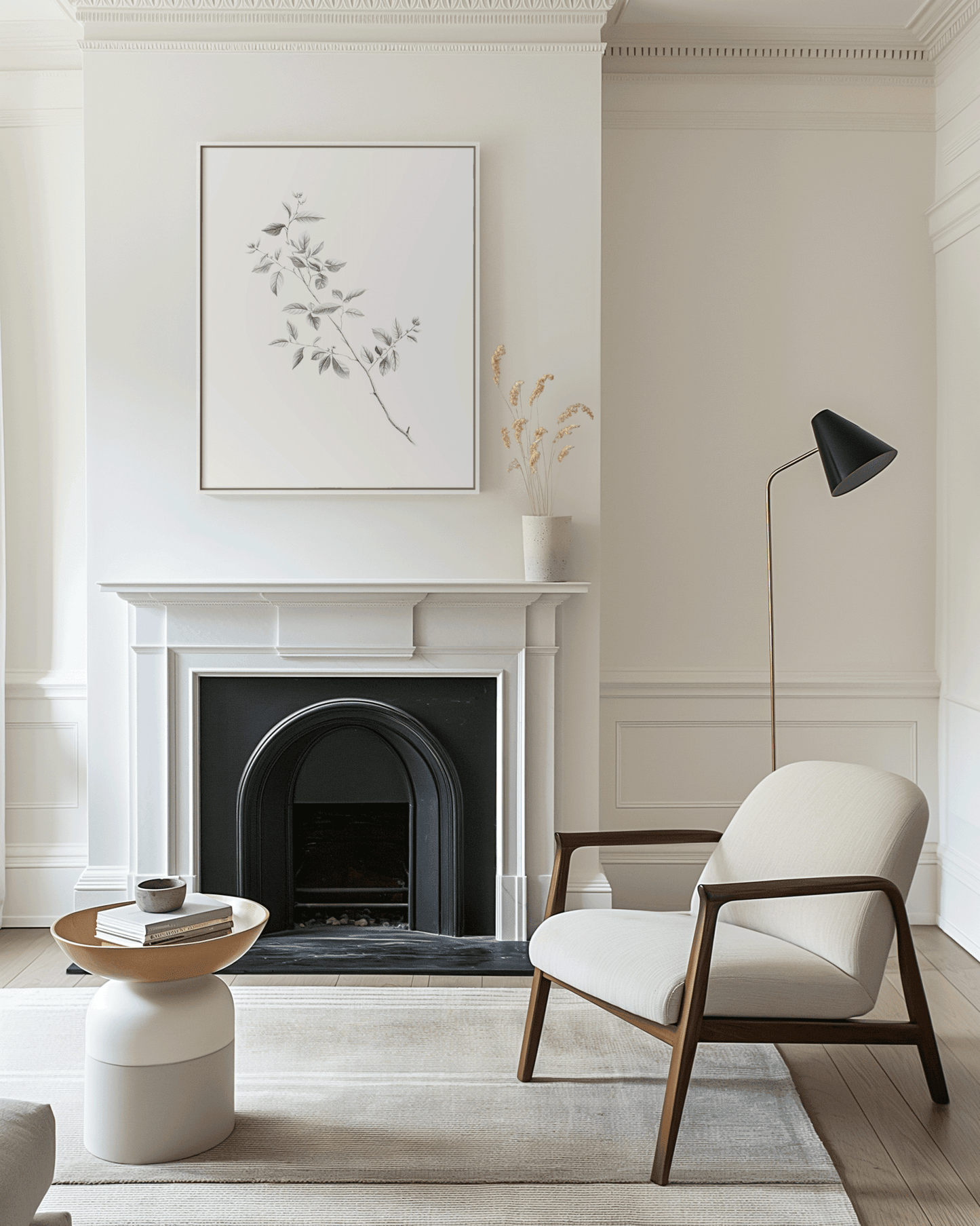 Large framed vintage botanical line art print styled above fireplace in neutral modern living room