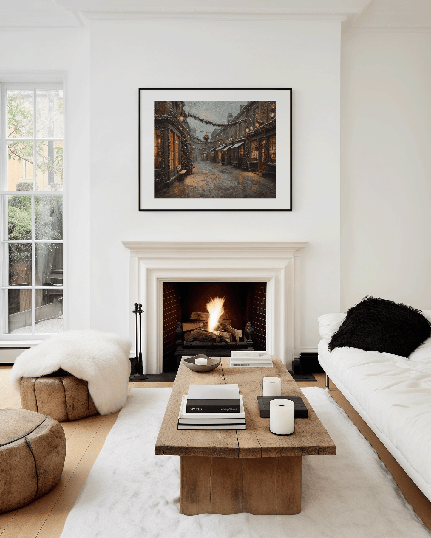 Minimalist living room with a modern fireplace and wood coffee table displaying a vintage Christmas village street scene wall art with snow, lamps, and warm storefront lighting.
