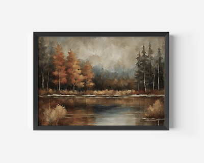 Moody fall landscape wall art in black frame featuring an autumn tree line over still water