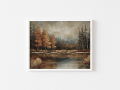 White framed moody landscape wall art of an autumn forest and lake scene