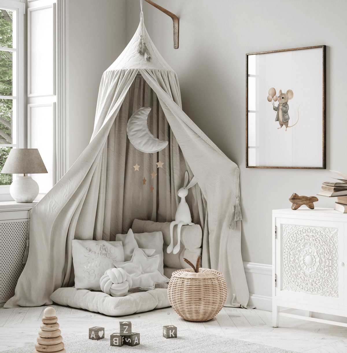 Mouse with balloons nursery print in a wood frame beside a canopy play nook in a kids' room