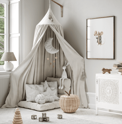 Mouse with balloons nursery print in a wood frame beside a canopy play nook in a kids' room