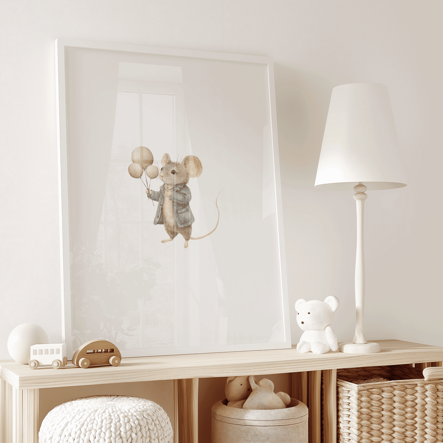 Watercolour mouse nursery print with balloons in a white frame in a soft neutral kids' room