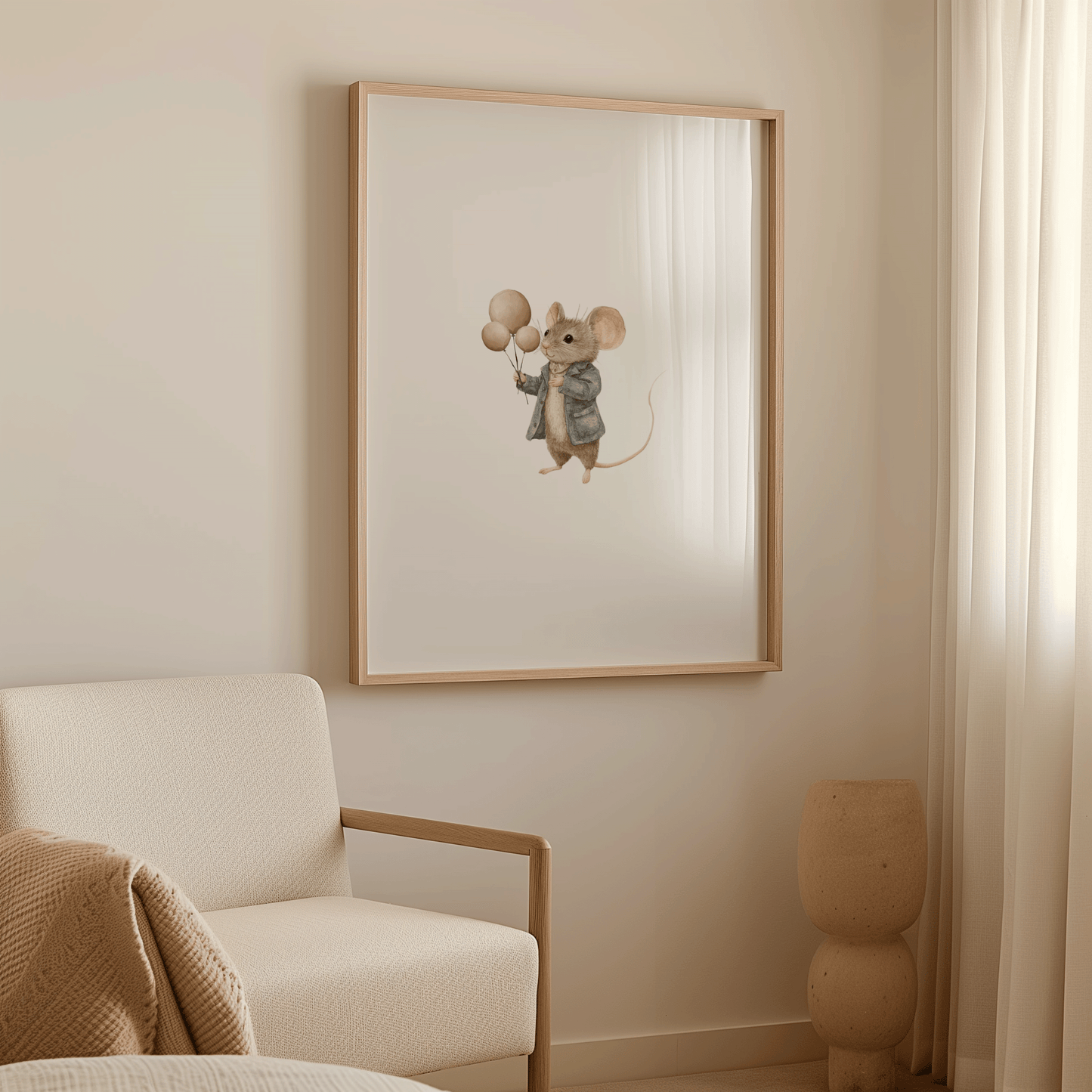 Watercolour mouse nursery wall art in an oak frame above a cream armchair in a neutral nursery