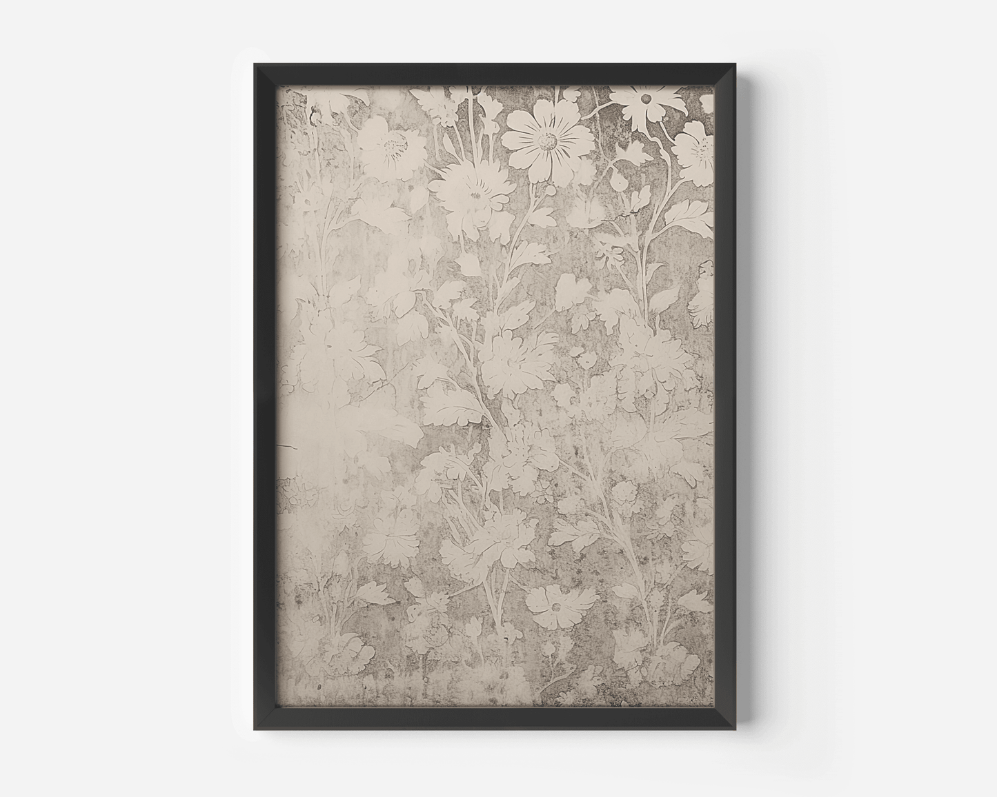 close up of vintage muted botanical wall art in black frame showing neutral floral detail