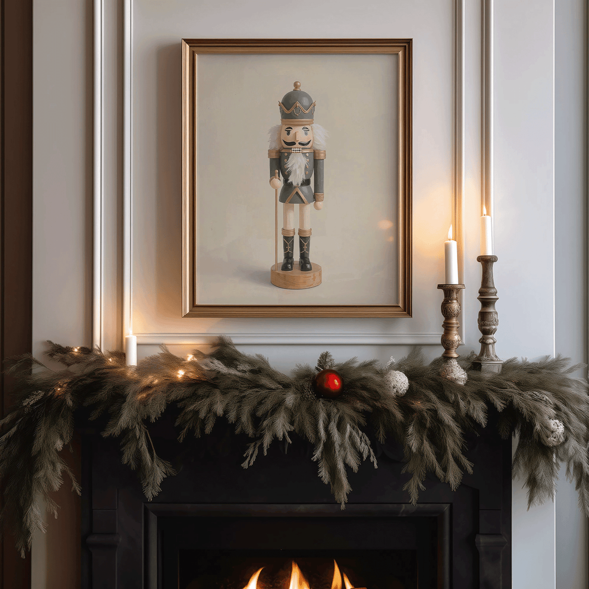 Framed vintage blue and gold nutcracker print above a holiday mantel with evergreen garland, candles and warm lights