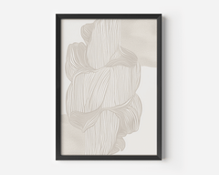 Neutral beige abstract line art print with a black frame featuring flowing organic linear forms in beige, cream and white colors on a white wall.  Modern minimalist wall art print ready to hang in living room,  bedroom, hallway or entryway.
