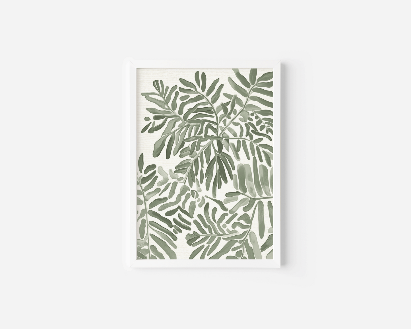 Single neutral botanical leaf wall art print featuring soft green foliage illustrated on a light background, shown as a white framed canvas print with a clean minimalist presentation
