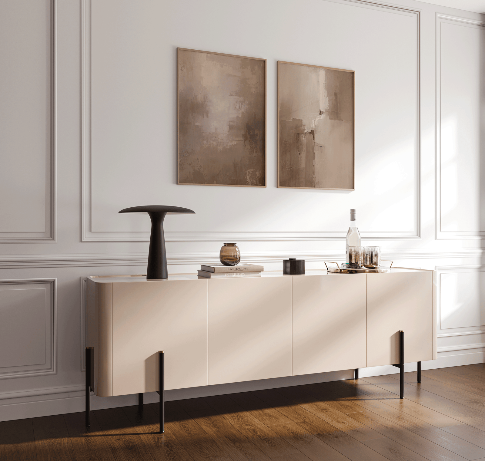 Set of large warm beige and brown abstract canvas prints in wood frames displayed above a modern sideboard in a dining room
