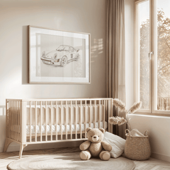 Neutral boy nursery with a crib, teddy bear and a framed vintage race car sketch on the wall