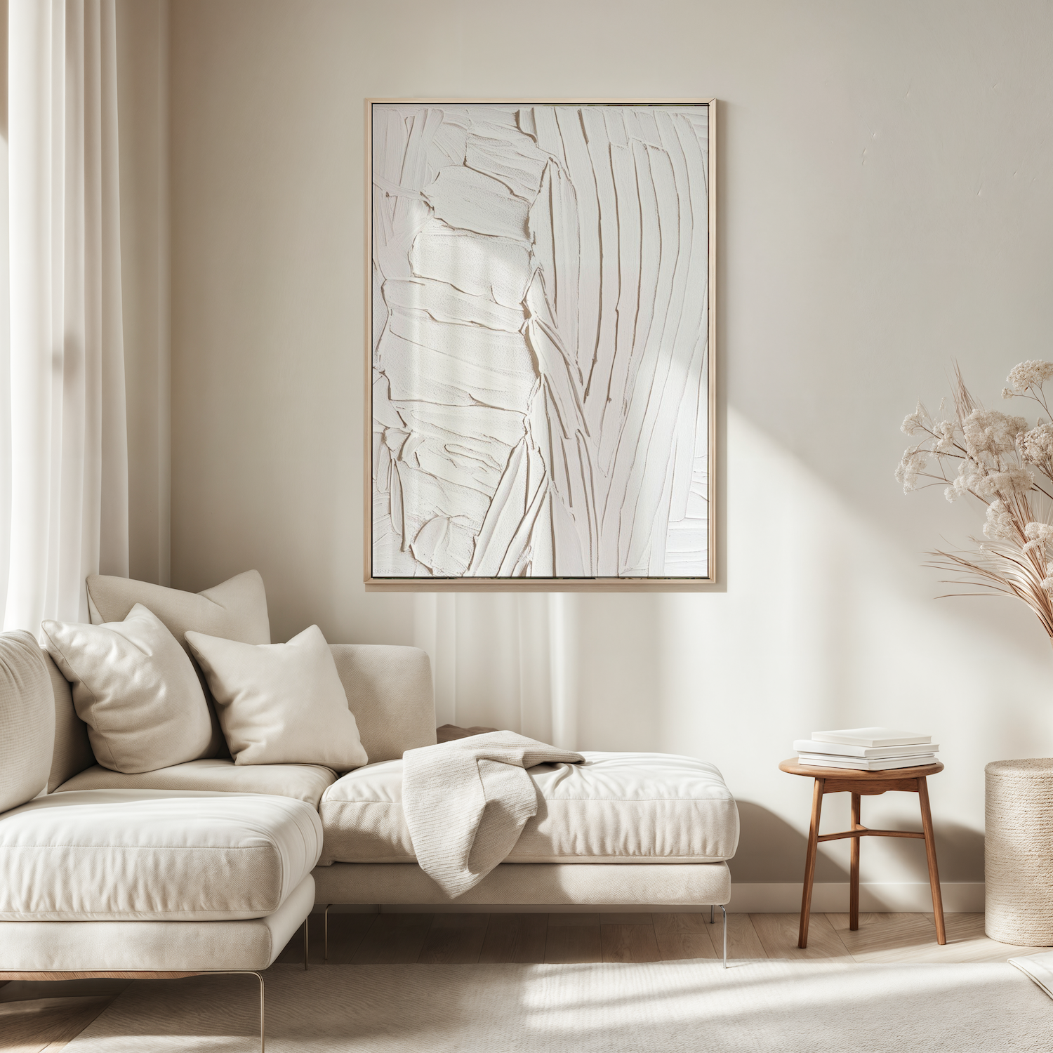 White minimalist abstract wall art with faux texture framed above beige sectional sofa in modern living room