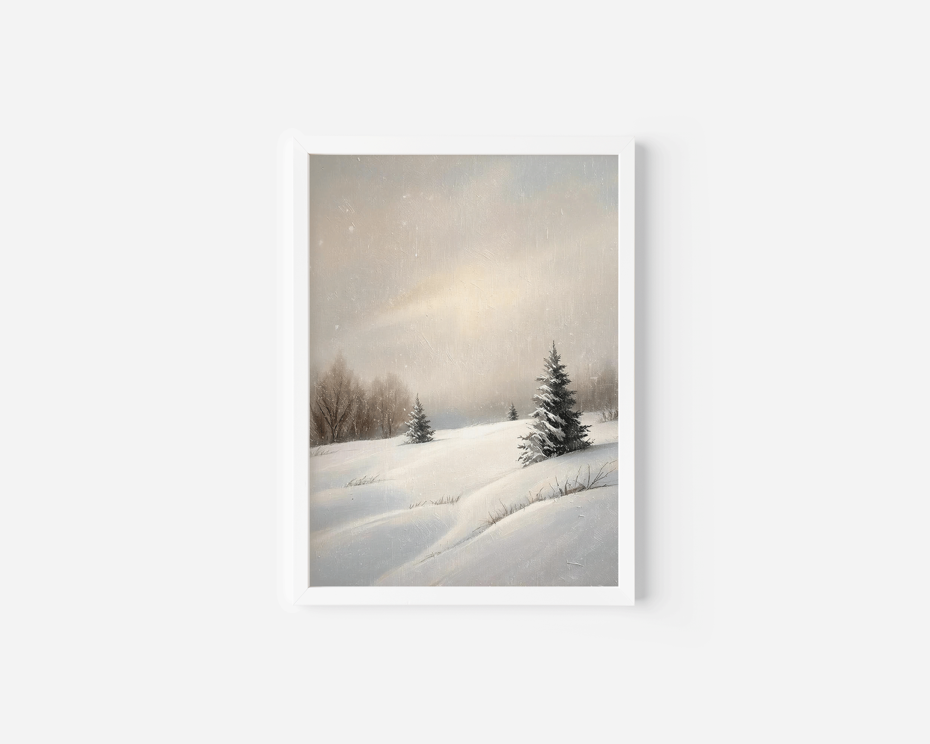 A neutral, winter snowy hill landscape printed in a white frame on a clean white background. A minimalist piece with neutral beige and green tones and evergreen trees with a muted sky.