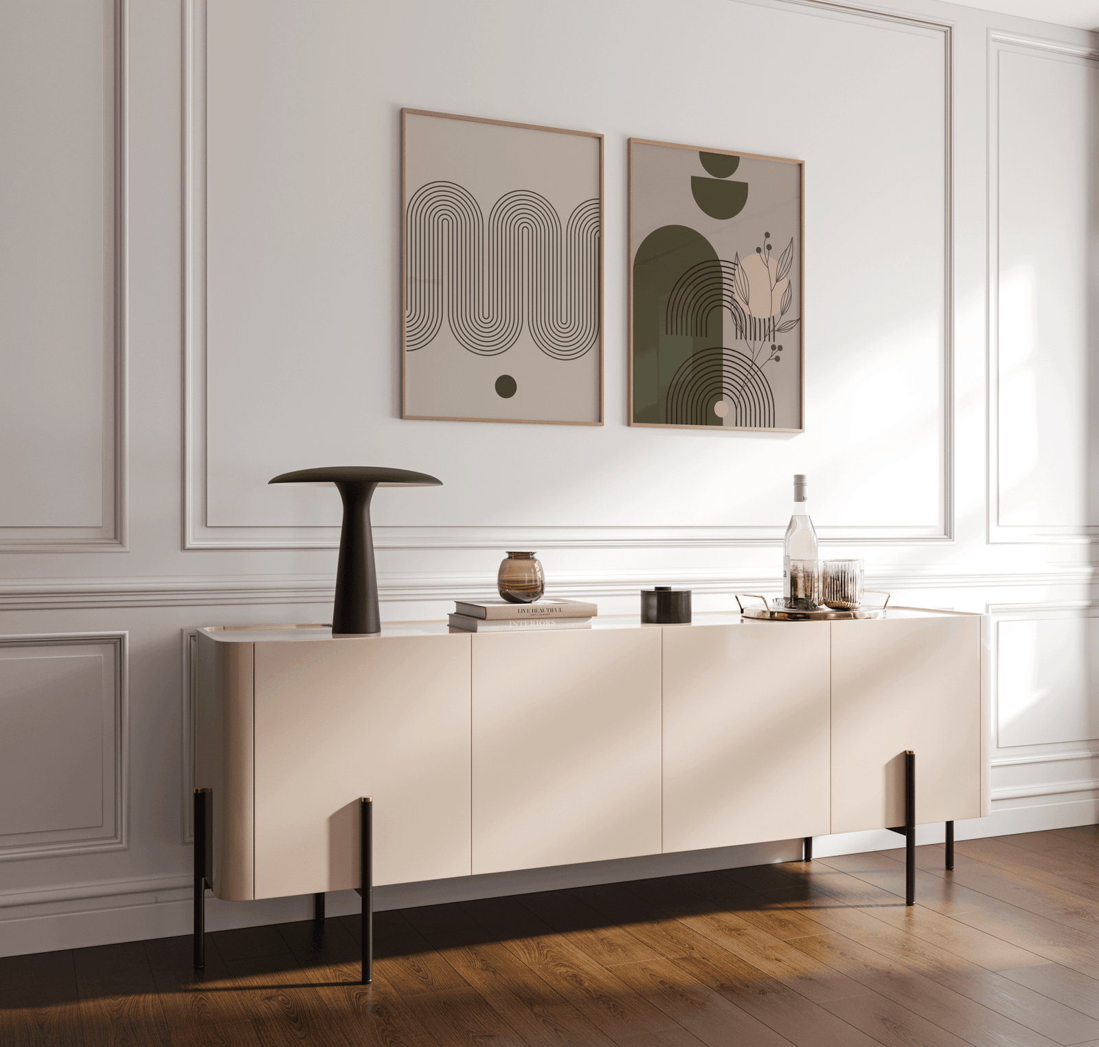 Olive green and blush abstract wall art set in wood frames above a cream console in a bright dining room