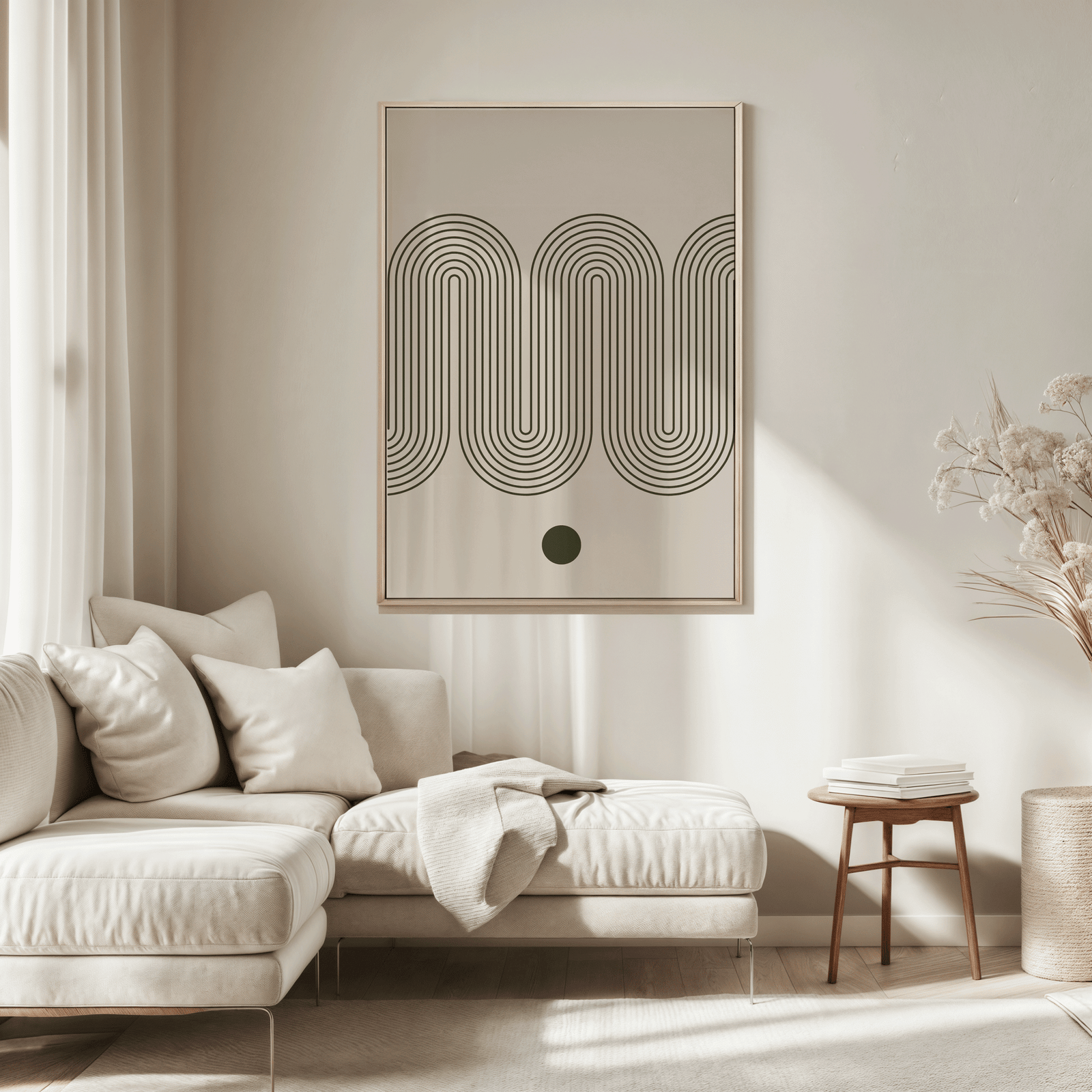 Olive green mid-century wave print above a beige sofa in a sunlit living room
