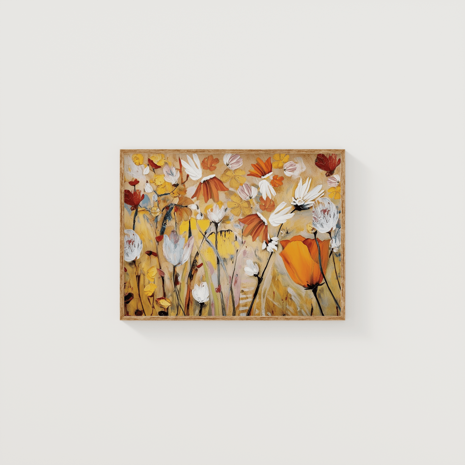 Orange and yellow floral wall art print featuring modern abstract botanical flowers in warm tones, displayed in a light wood frame on a white wall