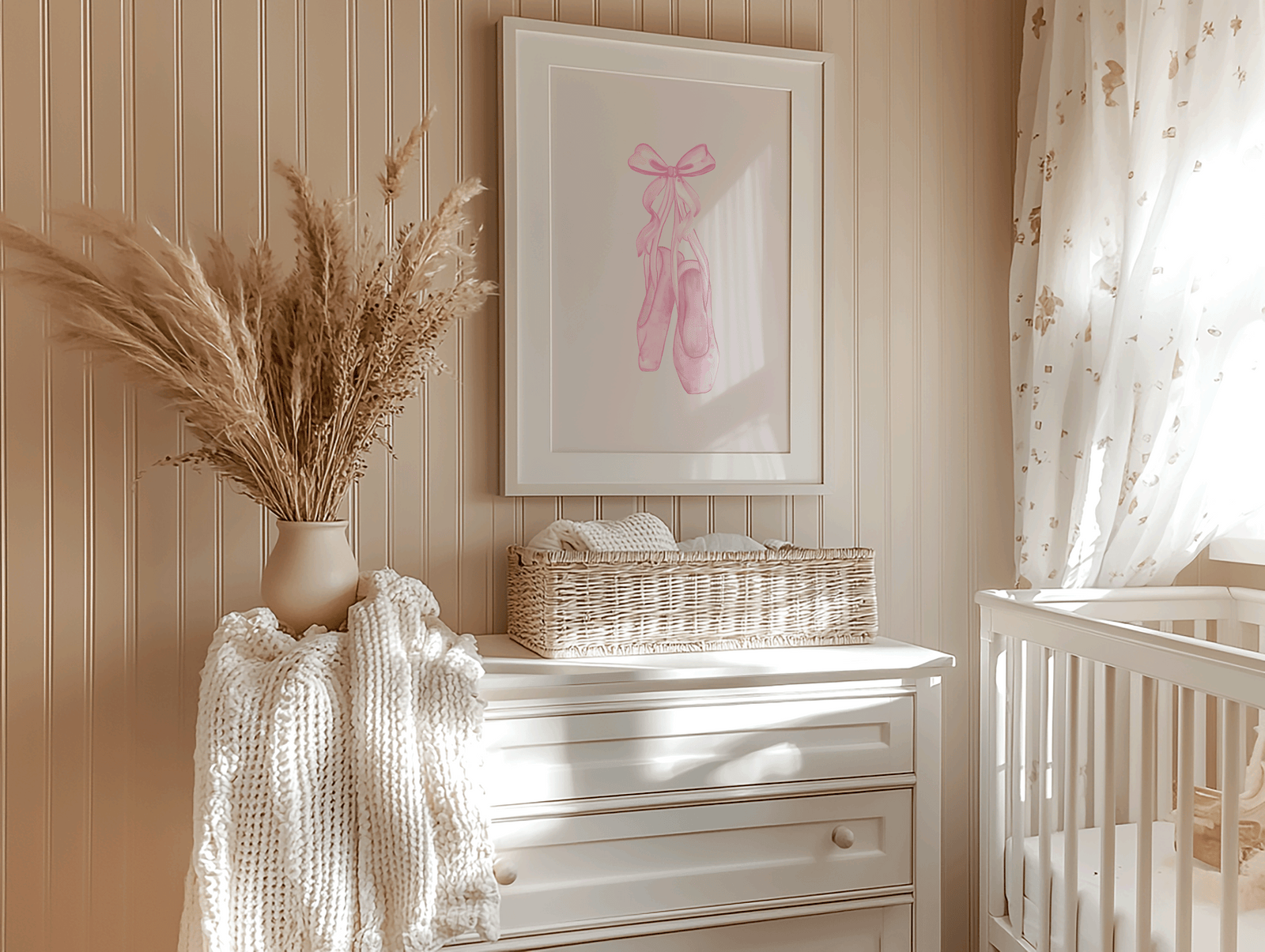 Pink ballerina slippers with pink coquette bow wall art framed above beige nursery dresser