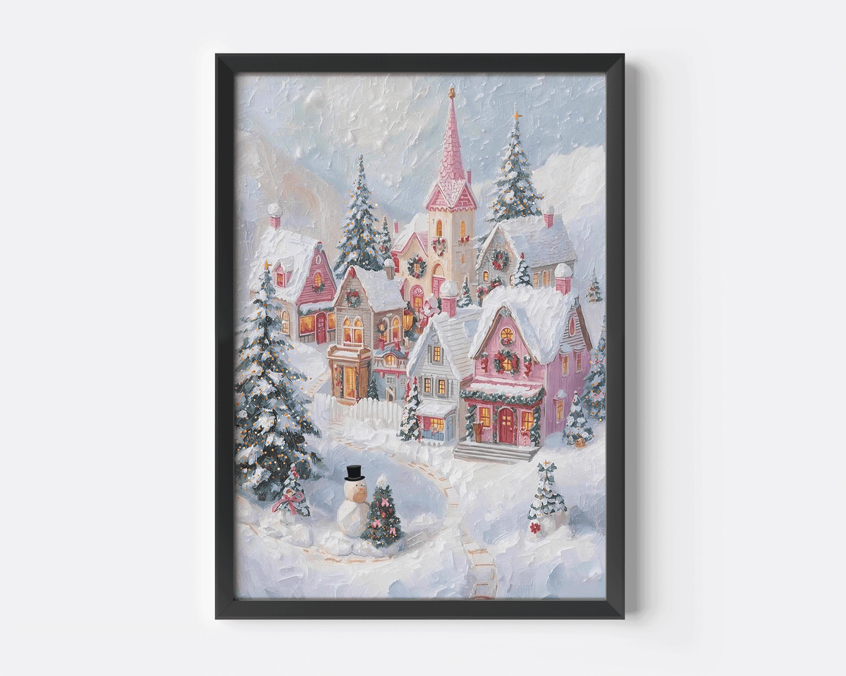Pink Christmas village print in a black frame with snowy pastel cottages and pine trees
