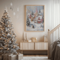 Pink Christmas village wall art in a light wood frame above a console beside a frosted Christmas tree