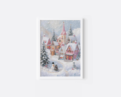 Pink Christmas village print in a white frame with snowy cottages, pine trees and pastel pink roofs